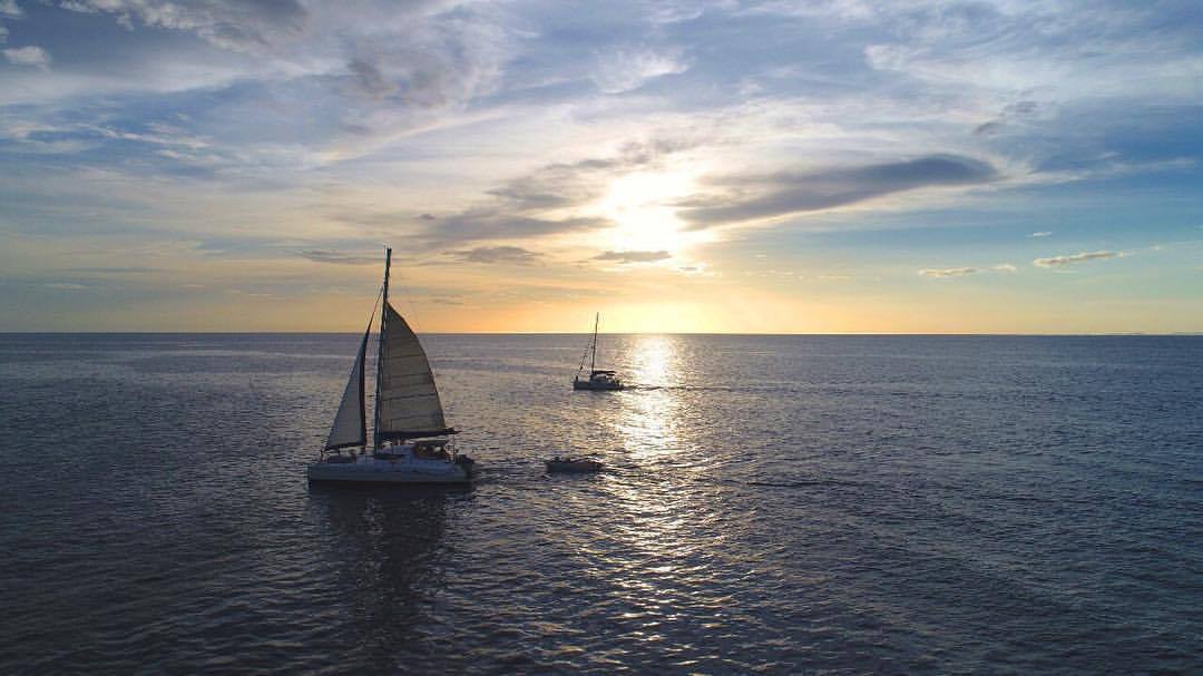 Sunset catamaran sailing